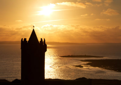 Silhouette Of Doonagore Castle At Sunset Ireland