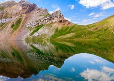 Reflections On The Asnos Lake In Panticosa, Spanish Pyrenees