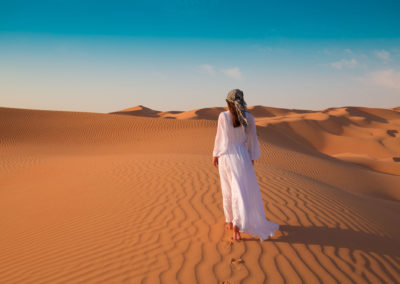 UAE. Woman In Desert