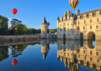 Hot Air Ballons Over The Palace Of Chenonceau