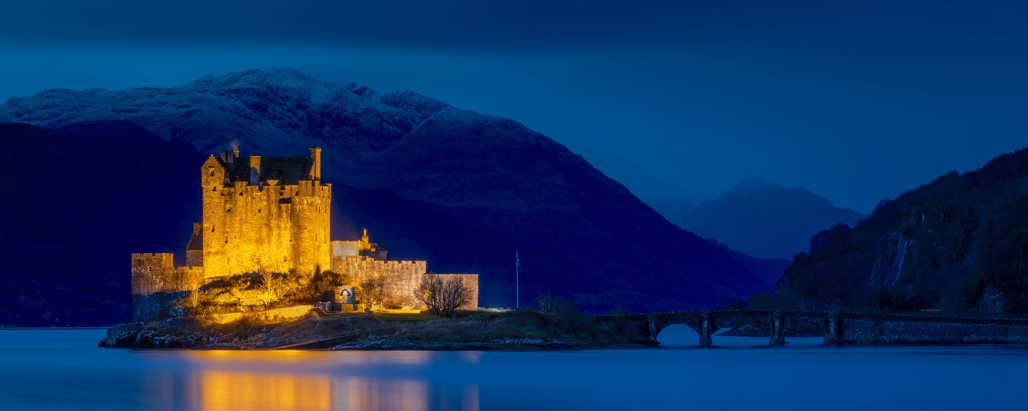 Scottish Castle, Eilean Donan Castle Scotland. Highlander Castle In The Scottish Highlands Near The Isle Of Skye. Famous Castle In Scotland