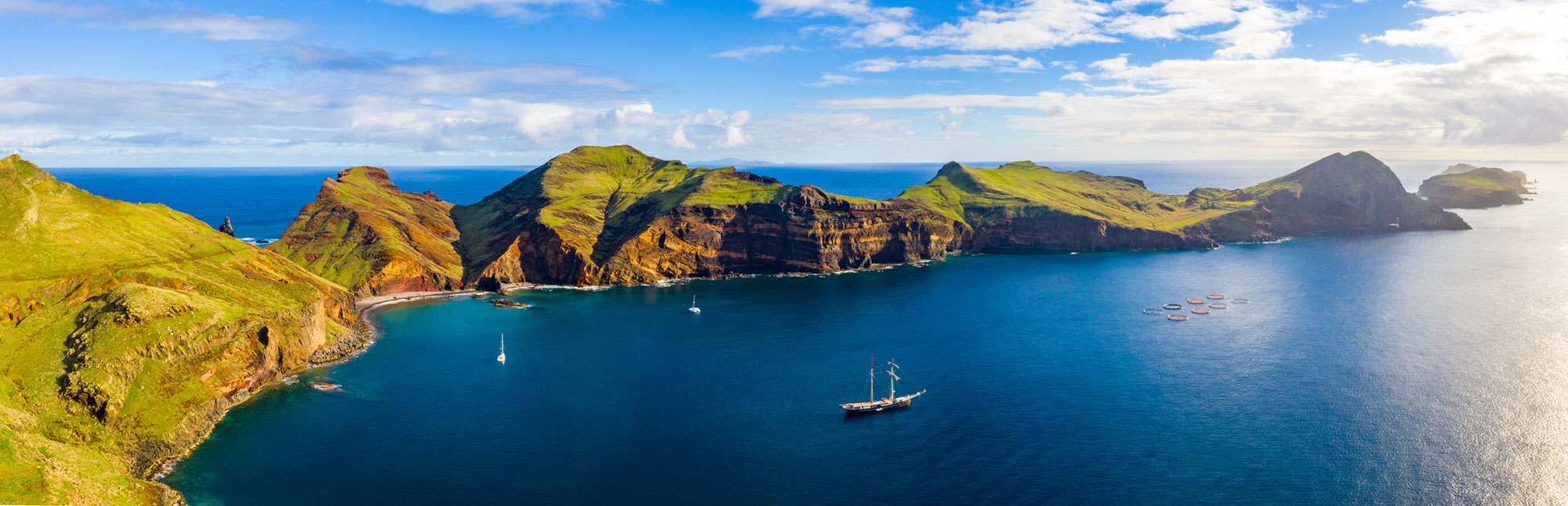 Aerial Tropical Island View In The Middle Of The Ocean With Rock Aerial Tropical Island View In The Middle Of The Ocean With Rock
