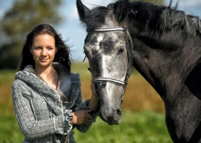 Attractive Young Woman With Beautiful White And Gray Horse Camar