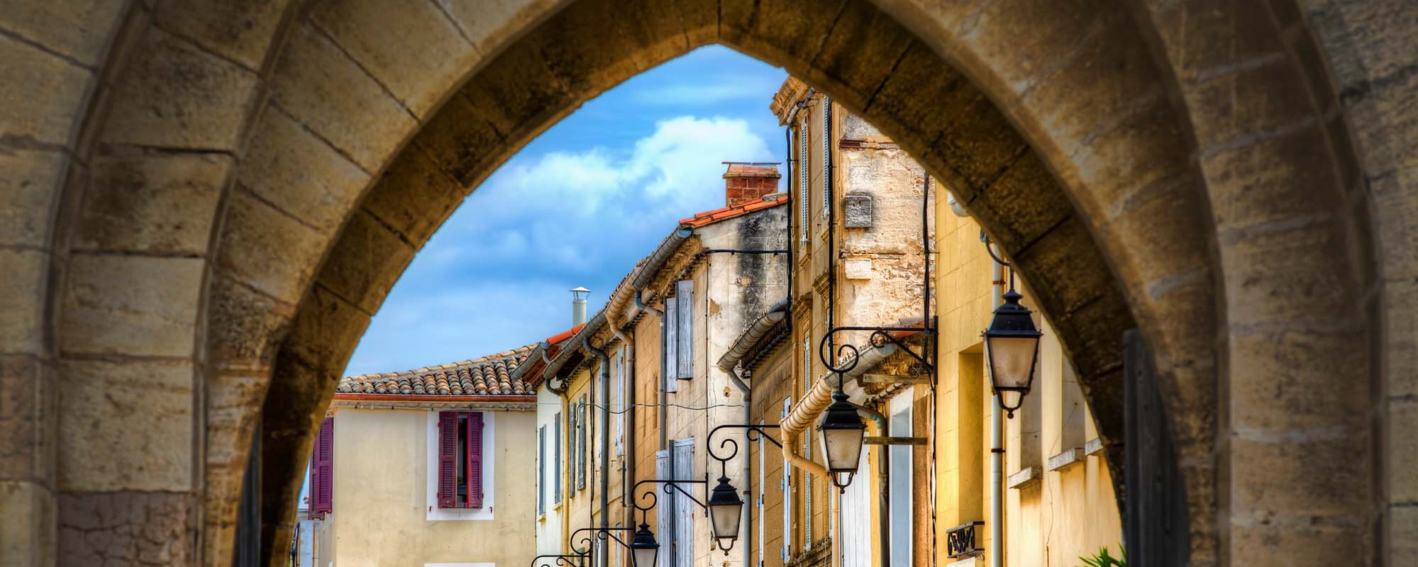 Looking Through One Of The Southwestern Gates Of The Fortified City Of Aigues Mortes, Occitanie, France