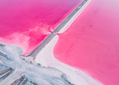 Aerial View Of Pink Salt Lake. Salt Production Plants Evaporated