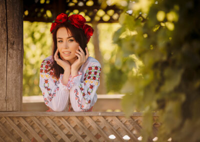Young Redhead Moldavian Girl Dressed In Traditional Costume Wit