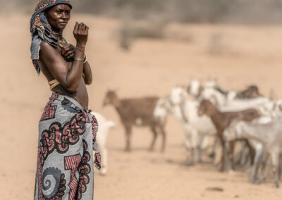 An Ovakuvale Woman With Her Goats