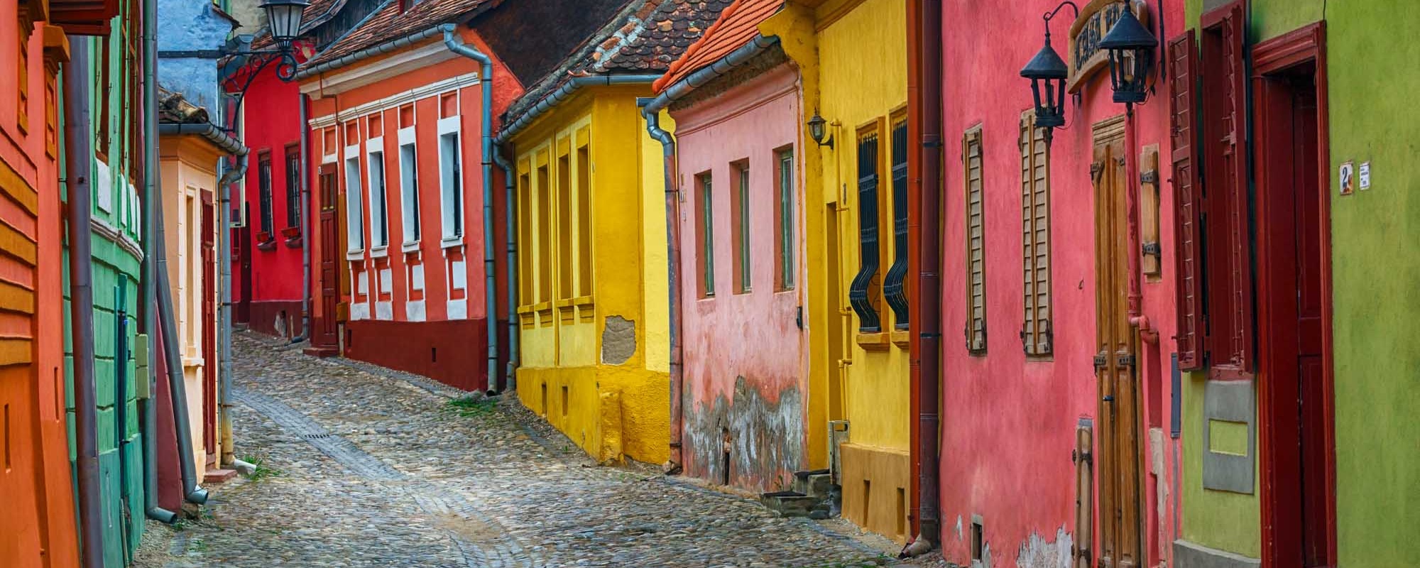 Cityscape Of Colorful Street In Old Town Sighisoara, Romania