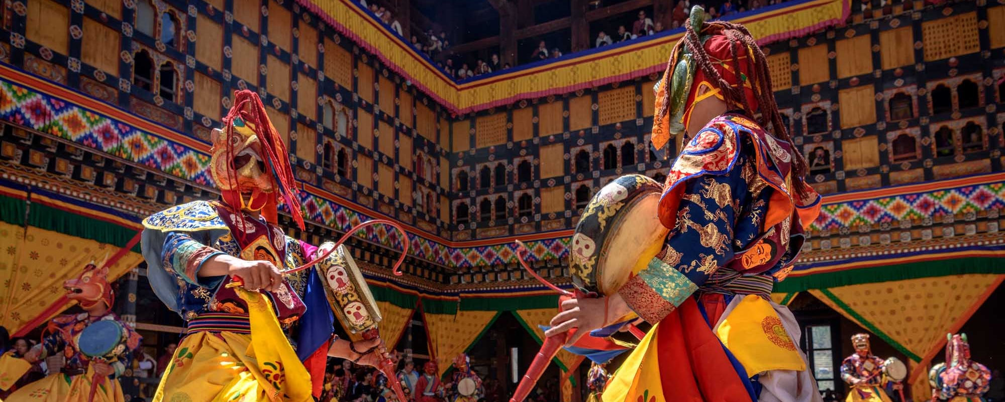 Bhutan Monk Dancing For Colorful Mask Dance At Yearly Paro Tsechu Festival In Bhutan