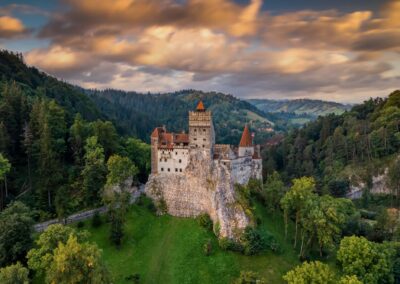Bran Castle At Sunset. The Famous Dracula's Castle In Transylvan