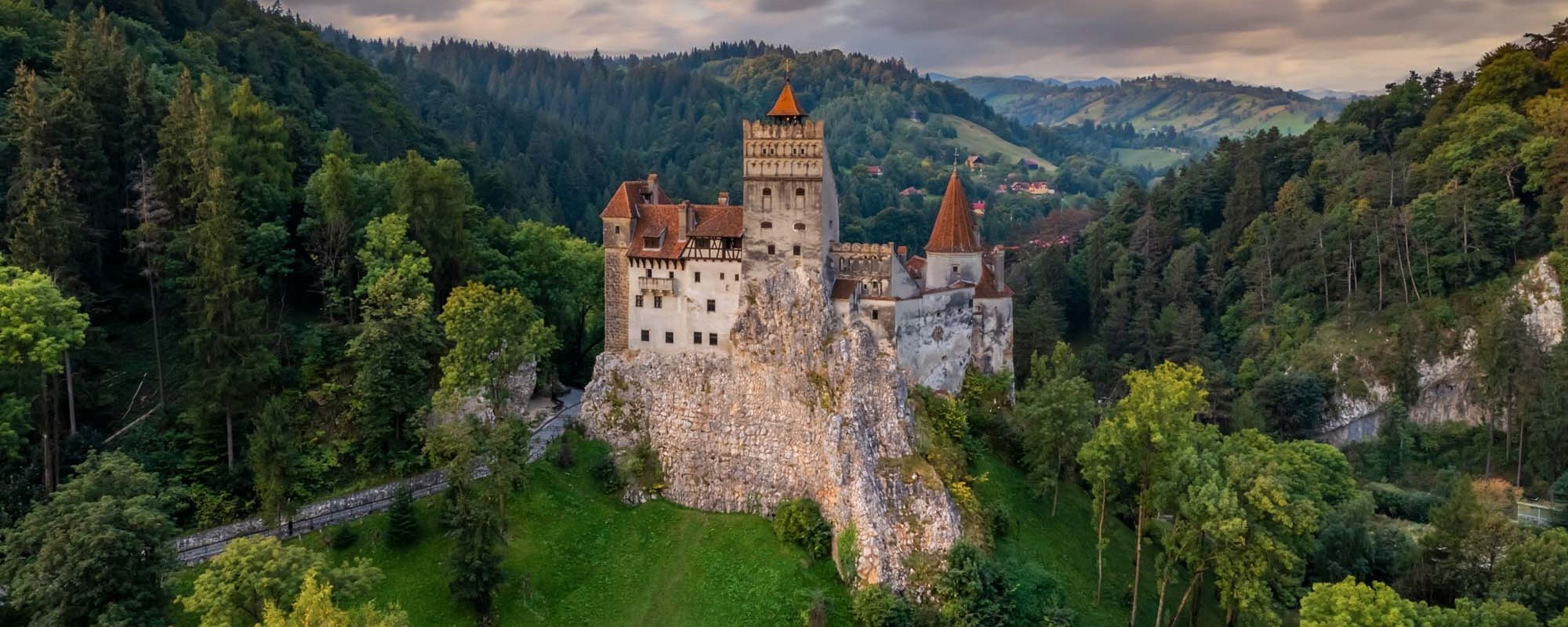 Bran Castle At Sunset. The Famous Dracula's Castle In Transylvania, Romania