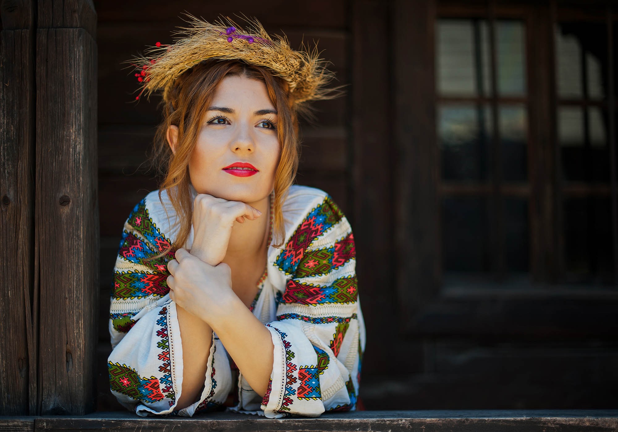 Beautiful Young Woman Posing In Romanian Traditional Costume.