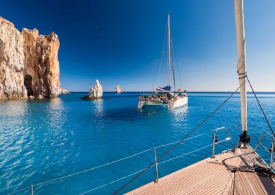 Boats At Anchor In The Turquoise Sea Of The South Coast Of The U